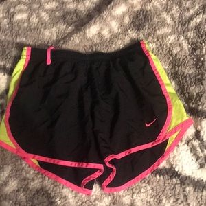Girls medium Nike shorts black neon